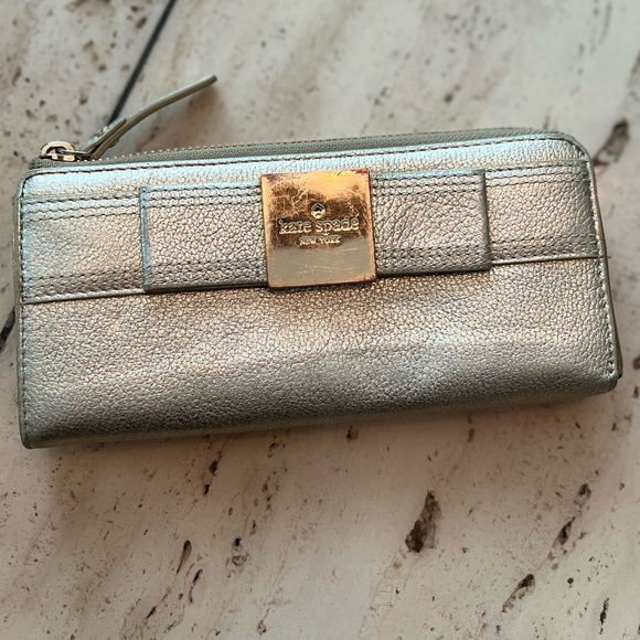 kate spade Handbags - Kate Spade Gold Primrose Zipper Wallet